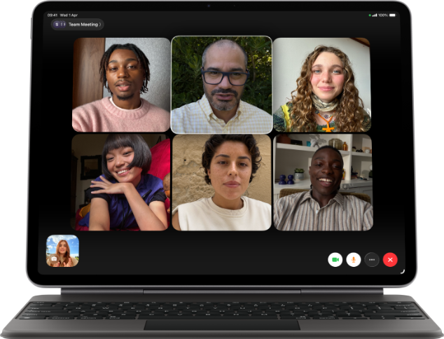 iPad Air, attached to Magic Keyboard, Black colour, Group FaceTime call on screen