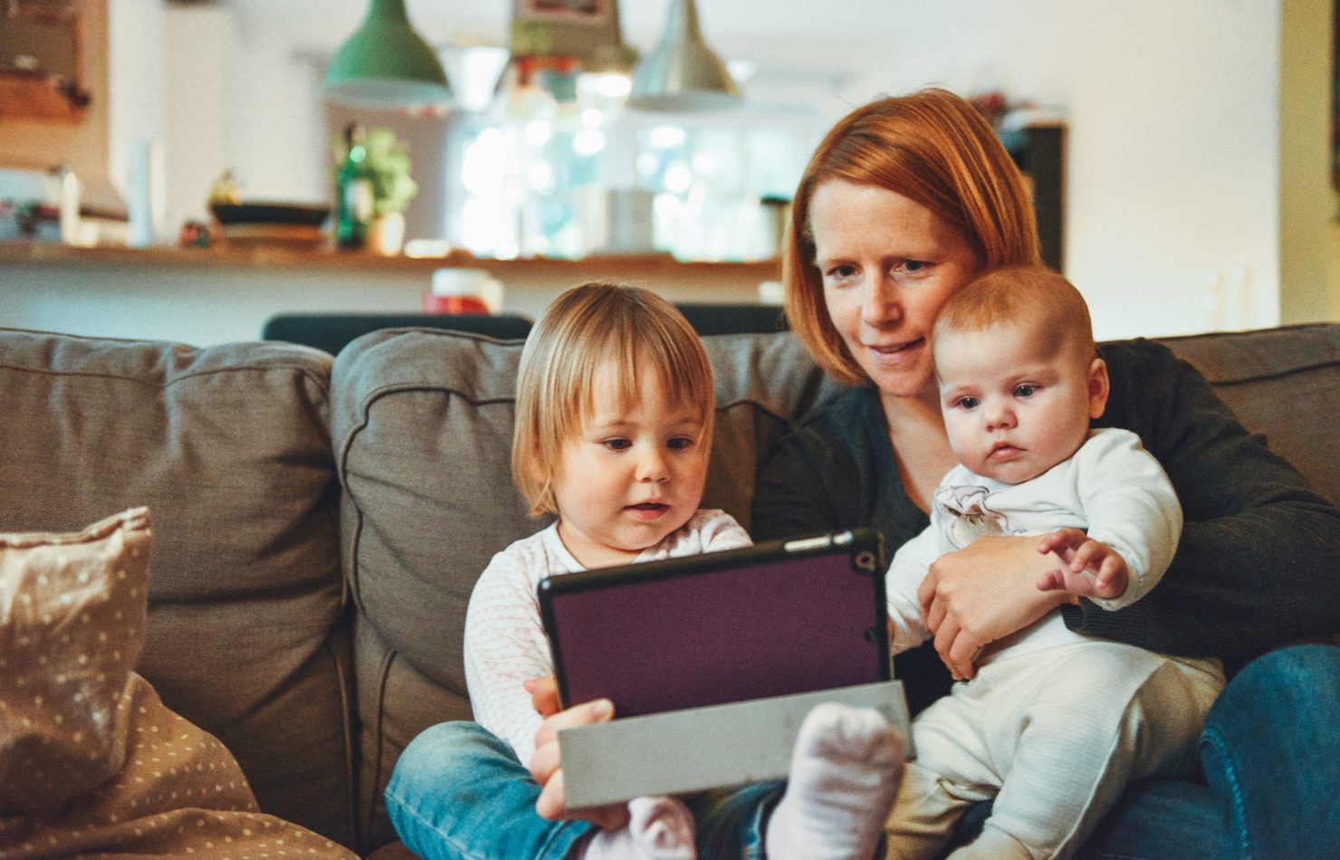 Family learning how to set up Family Sharing