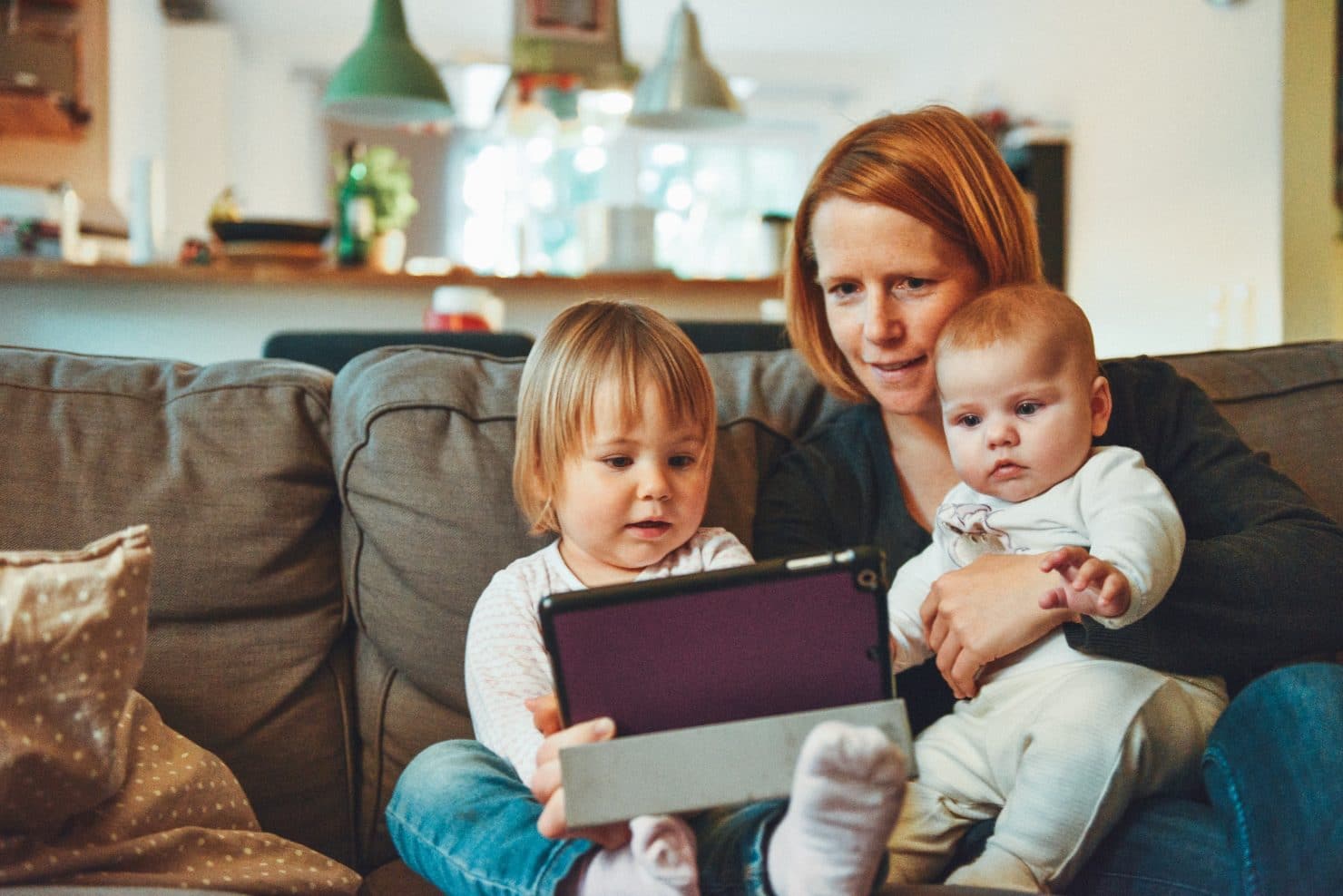 Family learning how to set up Family Sharing