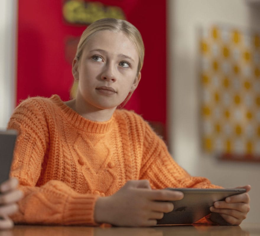 girl learning on iPad