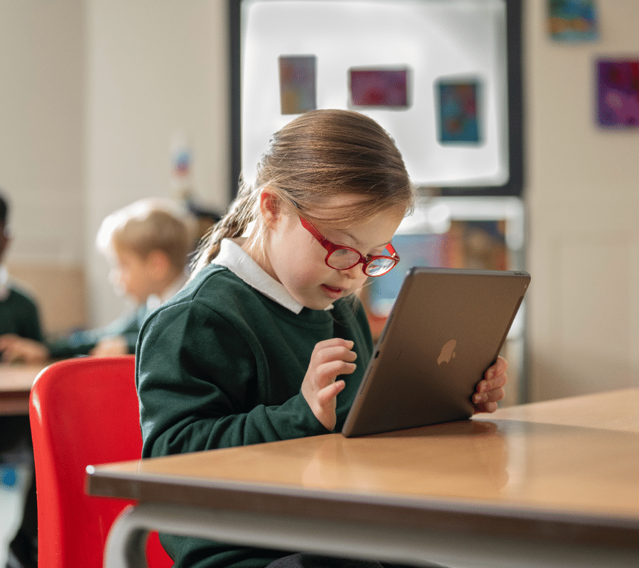 GAAD Student with iPad in classroom