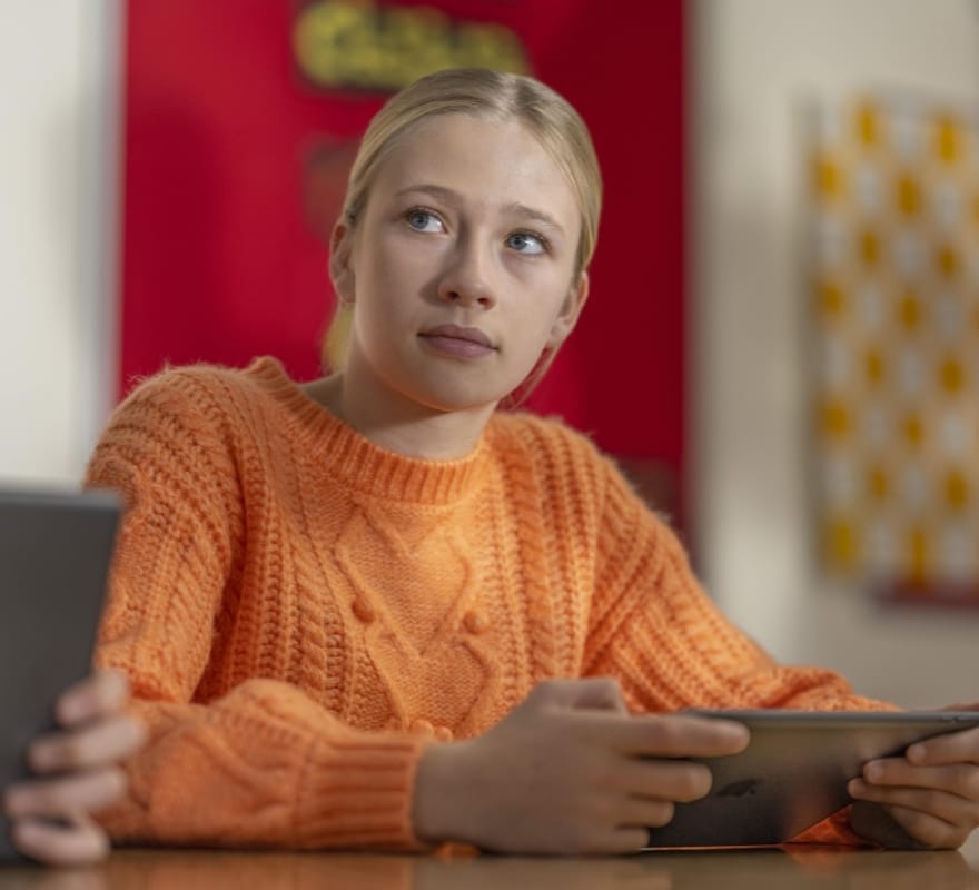 Student using iPad in class