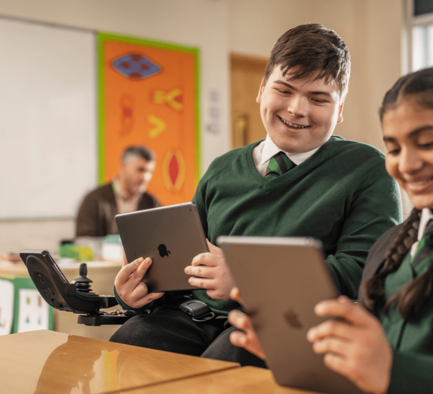 SEND student in wheelchair using iPad
